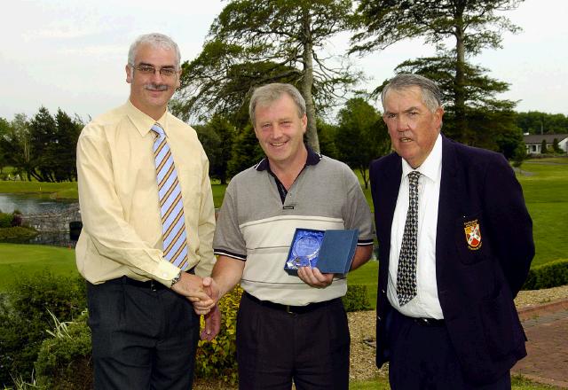 Castlebar Golf Club Eamonn Mongan Overall Net Winner 
 L-R: Val Jennings (Mens Captain), Eamonn Mongan, John Galvin (Mens President).  Photo  Ken Wright Photography 2007. 
