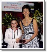 Castlebar Golf Club Lady Presidents Night Presentations Margaret Tighe Lady President presenting the Lady President Perpetual Trophy to the best junior girl Sarah Prendergast.  Photo  Ken Wright Photography 2007. 

