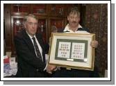 Pictured is Patrick Prendegast (right), winner of the President's Day prize at Castlebar Golf Club, receiving his prize from club president John Galvin. Photo: Ken Wright Photography