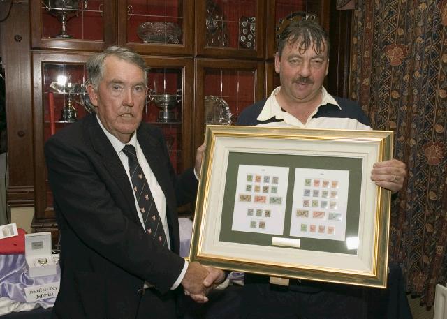 Pictured is Patrick Prendegast (right), winner of the President's Day prize at Castlebar Golf Club, receiving his prize from club president John Galvin. Photo: Ken Wright Photography