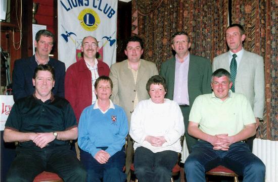 Castlebar Lions Golf Club AM AM proceeds of which are going to Mayo Cancer Support Association Rock Rose House St. Patricks Ave. The money raised will go towards the extension, which is at the planning stage. Castlebar Lions Club would like to thank all the teams who took part, the sponsors, Castlebar Golf Club and their staff for the use of their facilities.
AIB 3rd place Team Front L-R: Eamon Glancy, Carmel Moran, Sheila Baines, Peter Horkan. Back L-R: Gerry Needham (Lions Club), Billie Irwin (vice president Lions Club), Iarla Duffy (Lions Club), Joe Staunton (Mayo Cancer Support Association), Pat Doyle (vice captain Castlebar Golf Club): Photo © Ken Wright Photography 2005