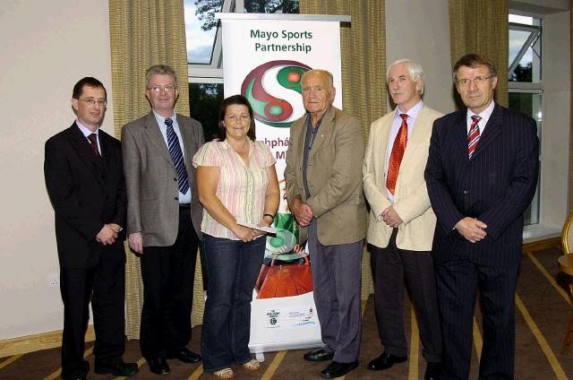 Mayo Sports Partnership 2007 Special Participation Grant Scheme recipients
Pictured in Breaffy International Sports Hotel Liazanne Donnelly, representing Nephin All Stars Basketball Club receiving her cheque from the members of the Mayo Sports Partnership Board L-R: Gerry McGuinness , Tony Cawley,  Liazanne Donnelly, Mick Loftus,  Bernard Comiskey, Pat Stanton (Chairman Mayo Sports Partnership Board),.Photo  Ken Wright Photography 2007 
