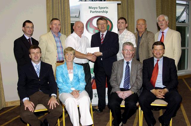 Mayo Sports Partnership 2007 Special Participation Grant Scheme recipients
Pictured in Breaffy International Sports Hotel, Anthony McDonnell and  Patsy McHale representing Castlebar Town Football Club receiving their cheque from the members of the Mayo Sports Partnership Board Front L-R: Niall Sheridan (Mayo County Council), Teresa Ward, Tony Cawley, John OMahony (Mayo GAA Team Manager), Back L-R: Gerry McGuinness, Micheal McNamara (Mayo County Council), Anthony McDonnell, Pat Stanton (Chairman Mayo Sports Partnership Board), Patsy McHale, Mick Loftus, Bernard Comiskey. .Photo  Ken Wright Photography 2007 
