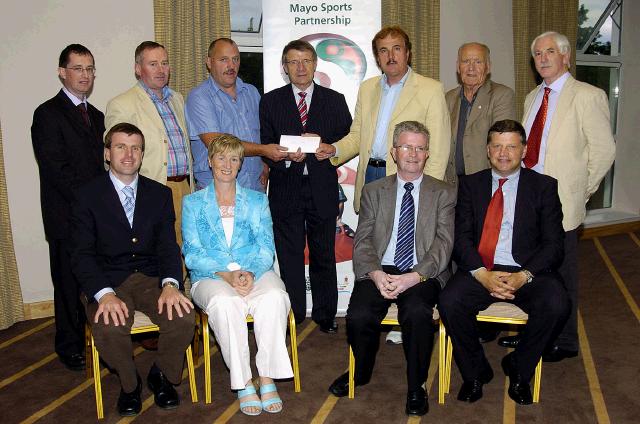 Mayo Sports Partnership 2007 Special Participation Grant Scheme recipients
Pictured in Breaffy International Sports Hotel, Michael Howley and Martin Cassidy representing CSKA Killasser receiving their cheque from the members of the Mayo Sports Partnership Board Front L-R: Niall Sheridan (Mayo County Council), Teresa Ward, Tony Cawley, John OMahony (Mayo GAA Team Manager), Back L-R: Gerry McGuinness, Micheal McNamara (Mayo County Council), Michael Howley, Pat Stanton (Chairman Mayo Sports Partnership Board), Martin Cassidy, Mick Loftus, Bernard Comiskey. .Photo  Ken Wright Photography 2007 
