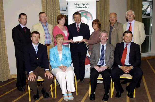 Mayo Sports Partnership 2007 Special Participation Grant Scheme recipients
Pictured in Breaffy International Sports Hotel, Mary Meade (Chairperson) and Margaret Kenny (Secretary) representing Culleen Ladies Club Ballina  receiving their cheque from the members of the Mayo Sports Partnership Board Front L-R: Niall Sheridan (Mayo County Council), Teresa Ward, Tony Cawley, John OMahony (Mayo GAA Team Manager), Back L-R: Gerry McGuinness, Micheal McNamara (Mayo County Council), Mary Meade, Pat Stanton (Chairman Mayo Sports Partnership Board), Margaret Kenny , Mick Loftus, Bernard Comiskey. .Photo  Ken Wright Photography 2007 
