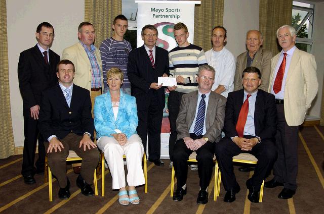 Mayo Sports Partnership 2007 Special Participation Grant Scheme recipients
Pictured in Breaffy International Sports Hotel, Jamie Forde, Eddie Smith and Patrick Glynn co-ordinator representing Club Vario Ballina  receiving their cheque from the members of the Mayo Sports Partnership Board Front L-R: Niall Sheridan (Mayo County Council), Teresa Ward, Tony Cawley, John OMahony (Mayo GAA Team Manager), Back L-R: Gerry McGuinness, Micheal McNamara (Mayo County Council), Jamie Forde, Pat Stanton (Chairman Mayo Sports Partnership Board), Eddie Smith and Patrick Glynn, Mick Loftus, Bernard Comiskey. .Photo  Ken Wright Photography 2007 

