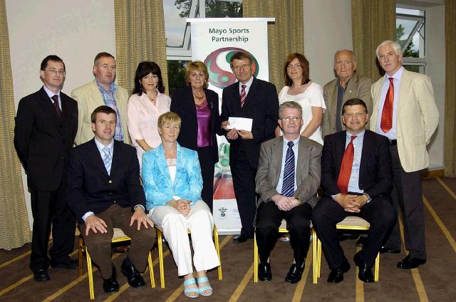 Mayo Sports Partnership 2007 Special Participation Grant Scheme recipients
Pictured in Breaffy International Sports Hotel, Martina Reid (Service Co-ordinator South Mayo), Rose Kerr (Service Co-ordinator Belmullet) and Rosealeen Nally (Sports Coordinator Belmullet) representing the  Irish Wheelchair Association receiving their cheque from the members of the Mayo Sports Partnership Board Front L-R: Niall Sheridan (Mayo County Council), Teresa Ward, Tony Cawley, John OMahony (Mayo GAA Team Manager), Back L-R: Gerry McGuinness, Micheal McNamara (Mayo County Council), Margaret OHara, Pat Stanton (Chairman Mayo Sports Partnership Board), Brenda Decker, Mick Loftus, Bernard Comiskey. .Photo  Ken Wright Photography 2007 

