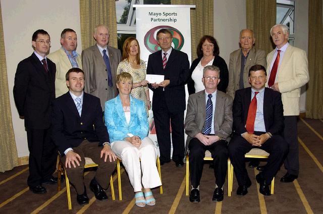 Mayo Sports Partnership 2007 Special Participation Grant Scheme recipients
Pictured in Breaffy International Sports Hotel Martin Moran (Volunteer Rehab Care),, Bernadette Coen (Programme Supervisor) and Lorraine Gibbons (Community Service Manager) representing Rehab Care Breaffy Castlebar  receiving their cheque from the members of the Mayo Sports Partnership Board Front L-R: Niall Sheridan (Mayo County Council), Teresa Ward, Tony Cawley, John OMahony (Mayo GAA Team Manager), Back L-R: Gerry McGuinness, Micheal McNamara (Mayo County Council), Bernadette Coen , Pat Stanton (Chairman Mayo Sports Partnership Board), Lorraine Gibbons, Mick Loftus, Bernard Comiskey. .Photo  Ken Wright Photography 2007
