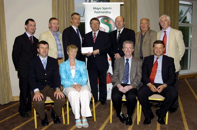 Mayo Sports Partnership 2007 Special Participation Grant Scheme recipients
Pictured in Breaffy International Sports Hotel, John Brennan and Brendan Heneghan representing Castlebar Cycling Club receiving their cheque from the members of the Mayo Sports Partnership Board Front L-R: Niall Sheridan (Mayo County Council), Teresa Ward, Tony Cawley, John OMahony (Mayo GAA Team Manager), Back L-R: Gerry McGuinness, Micheal McNamara (Mayo County Council), John Brennan, Pat Stanton (Chairman Mayo Sports Partnership Board), Brendan Heneghan, Mick Loftus, Bernard Comiskey. .Photo  Ken Wright Photography 2007

