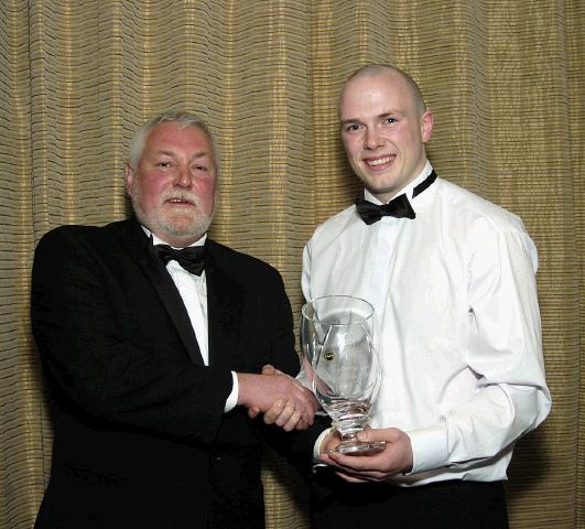 Castlebar Rugby Club Annual Dinner and Presentations held in Breaffy International Sports Hotel Trevor Ardle (President Castlebar Rugby Club), making a presentation to First Team Player of the Year Enda Murphy. Photo  Ken Wright Photography 2007. 