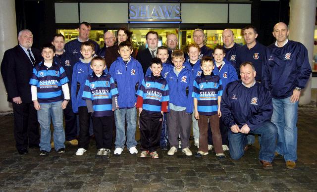 Pictured outside Shaws Department Store Castlebar at a presentation of shirts  for the Under age team Castlebar Rugby Club. Members of the under age team pictured with L-R:  Trevor Ardle (President Castlebar Rugby Club), Shane McElwee, Steve Allen (Coach), Keith Finan (Coach), Carmel McTigue (General Manager Shaws Department Store), Nigel Bradley (Retail Manager Shaws Department Store),  Paul OReilly (coach), John Hannigan (Coach), Liam Whyte(Coach), Mark Gaffney (Coach), Michael Tobin(Coach),  Front Michael Hastings (Under age Co-ordinator Castlebar Rugby Club), Photo  Ken Wright Photography 2007. 

