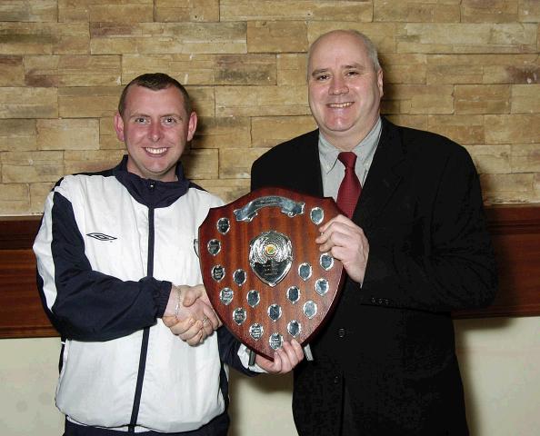 Mayo Schoolboys, Girls and Youths Presentations held in TF Royal Hotel & Theatre
Westport United under 14s Division 2 North winners, presentation to Kenneth Gannon (Coach) by Dave Breen (Secretary Mayo Schoolboys Girls and Youths).   Photo  Ken Wright Photography 2007. 

