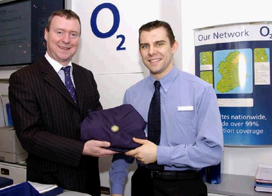 Connacht Senior Championships 
Presentation of an O2 track suit by James Given West of Ireland Area manager of O2 to John Walkin  of O2 retail Castlebar to mark his win in the Connacht  Senior 60 metre sprint Held in County Tipperary with the winning time of 7.11 seconds : Photo  Ken Wright Photography 2005 
