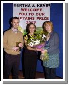 Castlebar Tennis Club Captains Day Patricia Armstrong (right) making a presentation on behalf of the club members to Kevin Egan Mens Captain and Bertha Munnelly, Lady Captain for all their hard work over the past year,. Photo  Studio 094.