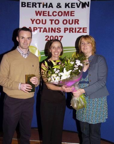 Castlebar Tennis Club Captain�s Day Patricia Armstrong (right) making a presentation on behalf of the club members to Kevin Egan Men�s Captain and Bertha Munnelly, Lady Captain for all their hard work over the past year,. Photo � Studio 094.