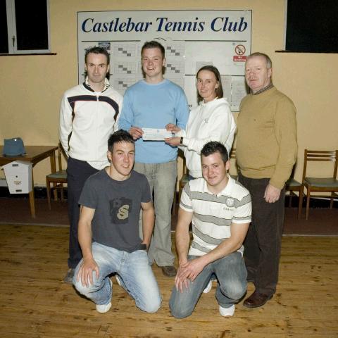 Pictured at Castlebar Tennis Club recently are a group of young climbers (Brendan, Martin and Brian) whom aim to climb Kilimanjoro in September 2007 in aid of cancer research at St. James's Hospital. They are pictured recieving the proceeds of a tennis charity tournament which was sponsored by Eddie Egan Jewellers. Front: Brian King and Martin Moran. Back (L - R): Kevin Egan (Captain, Castlebar Tennis Club), Brendan Coleman, Bertha Munnelly (Lady Captain, Castlebar Tennis Club), Donal Coleman. Photo: Ken Wright Photography