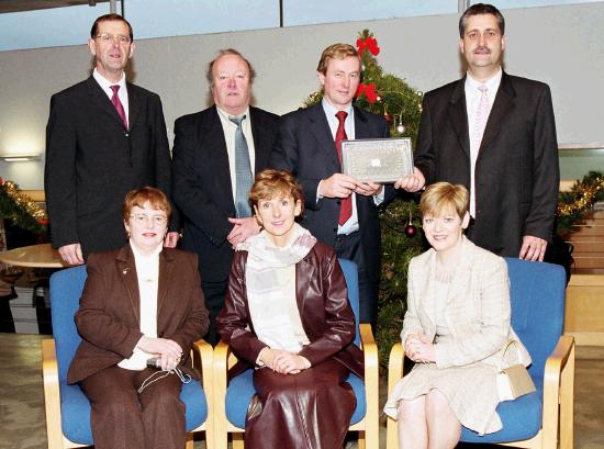 Enda Kenny TD & Leader of Fine Gael, presents Art  Silleabhin (ICT Advisor with Mayo Education Centre) with the Hibernia College Person of the Year 2004 Award, at a ceremony in Mayo Education Centre.
(Front L-R) ine Bhreathnach (Corr na Mna), Mire U Shilleabhin, Leas Promh Oide Scoil Raifteir, Dr. Toni McManus (Head of Education Hibernia College)
(Back L-R) Jim McHugh, Tom Armstrong, Enda Kenny TD & Leader of Fine Gael & Art  Silleabhin (ICT Advisor with Mayo Education Centre. (Photography by Ken Wright)
 
