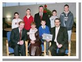 Enda Kenny TD & Leader of Fine Gael, presents Art  Silleabhin (ICT Advisor with Mayo Education Centre) with the Hibernia College Person of the Year 2004 Award, at a ceremony in Mayo Education Centre with the  Silleabhin family.
(Front L-R) Enda Kenny TD & Leader of Fine Gael, Mire U Shilleabhin, Leas Promh Oide Scoil Raifteir, Art g  Silleabhin.
(Back L-R) Fiachra  Silleabhin, Cian  Silleabhin, Dr. Sen Rowland (Chairman of Hibernia College), Darach  Silleabhin, Eoin  Silleabhin. (Photography by Ken Wright)
