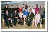 Enda Kenny TD & Leader of Fine Gael, presents Art  Silleabhin (ICT Advisor with Mayo Education Centre) with the Hibernia College Person of the Year 2004 Award, at a ceremony in Mayo Education Centre with the  Silleabhin family.
(Front L-R)  Dr. Sen Rowland (Chairman of Hibernia College), Enda Kenny TD & Leader of Fine Gael, Mire U Shilleabhin, Leas Promh Oide Scoil Raifteir, Art g  Silleabhin, Art  Silleabhin, Dr. Toni McManus (Head of Education Hibernia College) (Back L-R) Ronan OSullivan, Alice OSullivan, Dorrie Murphy, Cian  Silleabhin, Eoin  Silleabhin, Darach  Silleabhin, Fiachra  Silleabhin, Siobhan OConnor, Kevin Murphy. (Photography by Ken Wright)
