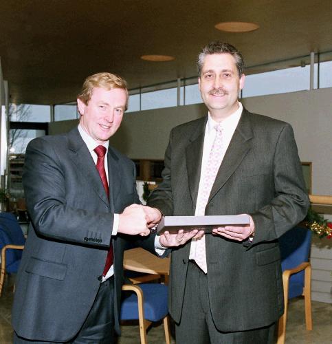 Enda Kenny TD & Leader of Fine Gael, presents Art  Silleabhin (ICT Advisor with Mayo Education Centre) with the Hibernia College Person of the Year 2004 Award, at a ceremony in Mayo Education Centre. (Photography by Ken Wright)
