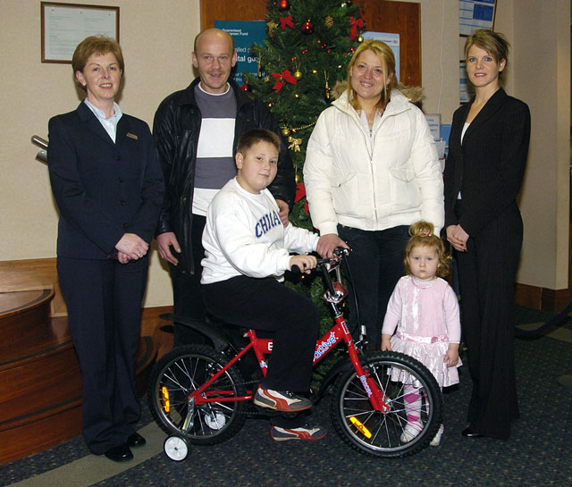 The Bank of Ireland Young Savers Account opening draw, winner of the bike Adrian Matusiak pictured with his sister Nikola , parents Marzena and Marek also Margaret Corkhill (Customer Services Manager)Left and Adrienne OMalley (Bank of Ireland). Photo  Ken Wright Photography 2007. 