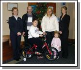 The Bank of Ireland Young Savers Account opening draw, winner of the bike Adrian Matusiak pictured with his sister Nikola , parents Marzena and Marek also Margaret Corkhill (Customer Services Manager)Left and Adrienne OMalley (Bank of Ireland). Photo  Ken Wright Photography 2007. 