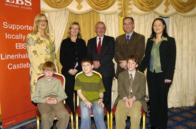 Pictured in the T.F. Royal Hotel & Theatre Castlebar winners of the I.N.T.O. / E.B.S.
Handwriting Competition Category C Front L-R: Conor Canning (St. Colmilles N.S. Westport), Thomas Fleming (Cloonlyon N.S. Charlestown), Cormac Muldoon (St. Anthonys N.S. Castlebar). Back L-R: Maire English (Co-ordinator), Stephanie Hope (teacher), Jim Higgins (C.E.C. of District IV - I.N.T.O.), Barney Kiernan (E.B.S.), Tara Biesty (E.B.S.). Photo  Ken Wright Photography 2007. 
