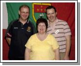 Iomad na lmh a bhaineann an cath / The abundance of hands wins the battlePictured in Breaffy GAA Clubhouse at the Mayo GAA Scr na bPist FinalsCoiste Scr Mhaigh Eo. Gearid De Brca, (Rna) Grinne U Cheallaigh (Cisteoir) agus Piaras  Raghallaigh (Cathaoirlach)