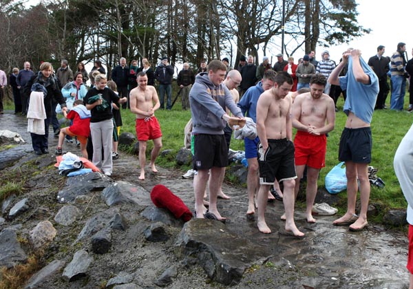 Some of the Brave swimmers tog out for their swim in the Icy waters of Lough Lannagh Castlebar on Christmas Day. Photo:  Michael Donnelly