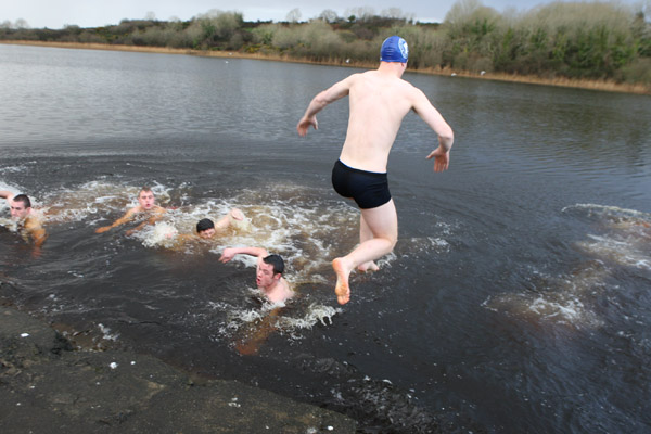 Taking the plunge in the Icy waters of Lough Lannagh Castlebar on Christmas Day. Photo:  Michael Donnelly