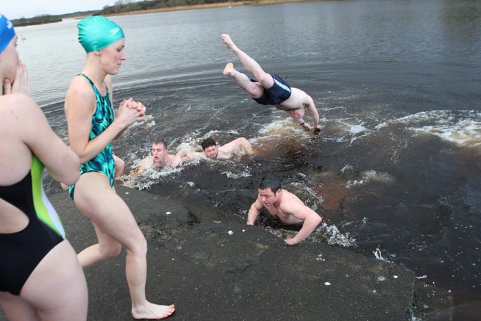 Taking the plunge in the Icy waters of Lough Lannagh Castlebar on Christmas Day. Photo:  Michael Donnelly