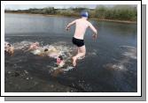Taking the plunge in the Icy waters of Lough Lannagh Castlebar on Christmas Day. Photo:  Michael Donnelly