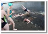 Taking the plunge in the Icy waters of Lough Lannagh Castlebar on Christmas Day. Photo:  Michael Donnelly
