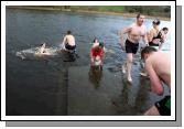 Some of the Brave swimmers who endured the Icy waters of Lough Lannagh Castlebar pictured after their swim on Christmas Day. Photo:  Michael Donnelly