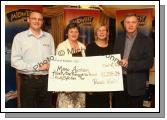 Padraic Walsh of Mid West Radio presents a cheque for 41,298 Euros 24 cent from his Magnificent 7 Fundraising Challenge to Mary Lydon and Carmel and Enda Hiney of Mayo Autism. Photo:  Michael Donnelly