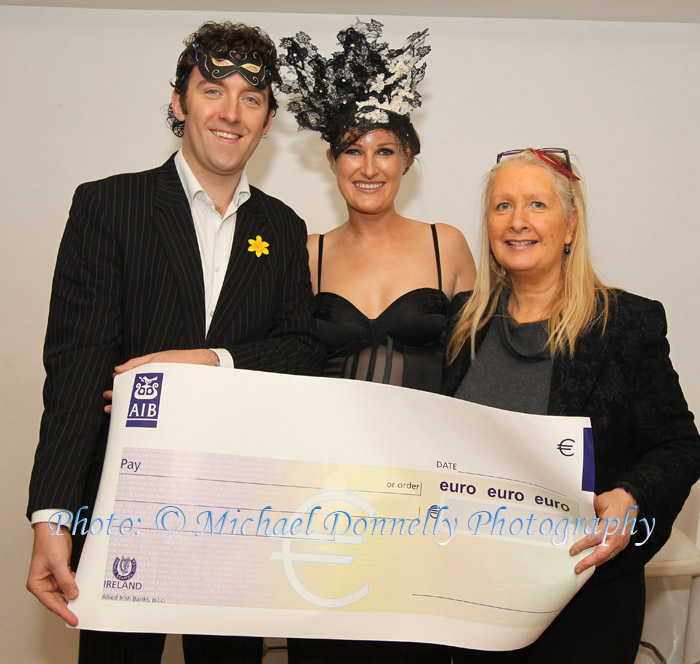 Justin McDermott, Community Fundraiser Connaught Ulster at Irish Cancer Society  is presented with a Cheque by Joane Maloney (event organiser) and Mary Jennings,  Royal Theatre, Castlebar, at The Masquerade Ball in the Royal Theatre Castlebar in aid of the Irish Cancer Society and Officially Sponsored by Tia Maria. Photo: © Michael Donnelly Photography