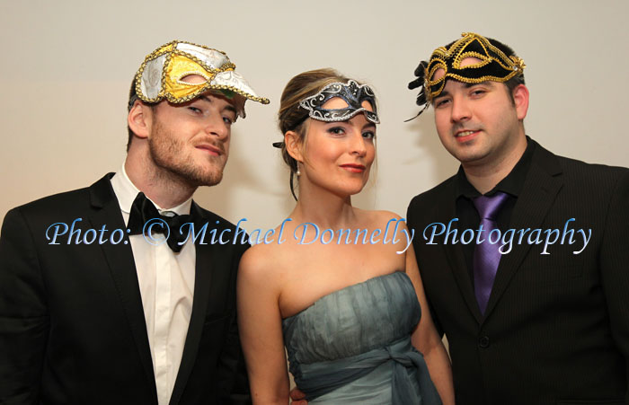 Rossa and Saoirse O'Dowd and John Gilroy, (all Castlebar) pictured  at The Masquerade Ball in the Royal Theatre Castlebar in aid of the Irish Cancer Society and Officially Sponsored by Tia Maria. Photo: © Michael Donnelly Photography