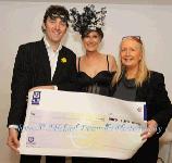 Justin McDermott, Community Fundraiser Connaught Ulster at Irish Cancer Society  is presented with a Cheque by Joane Maloney (event organiser) and Mary Jennings,  Royal Theatre, Castlebar, at The Masquerade Ball in the Royal Theatre Castlebar in aid of the Irish Cancer Society and Officially Sponsored by Tia Maria. Photo: © Michael Donnelly Photography