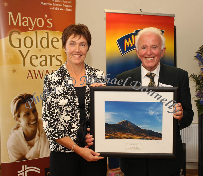 Mary McGuinness,  Homecare Medical Supplies presents the "Good Neighbour Award" to Tom Nyland, Pontoon Rd, Castlebar at the Mayo's Golden Years Awards at Homecare Medical Supplies Ballyhaunis in association with Mid West Radio. Photo:Michael Donnelly,