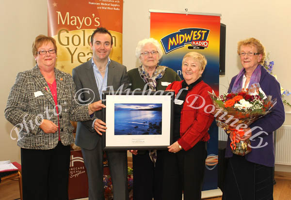 Charlestown Active Retirement Group pictured as they were presened with their award by Patrick Feeney, at the Mayo's Golden Years Awards 2010 at Homecare Medical Supplies Ballyhaunis in association with Mid West Radio from left: Mary Duffy, Singer Patrick Feeney, Elsie Jackson, Kath Ryan, and Evelyn O'Hara.Photo:Michael Donnelly