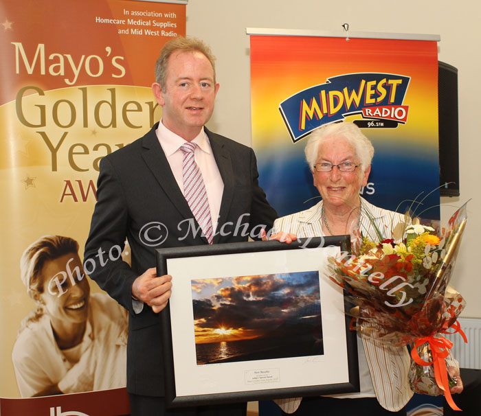 Peter McGuinness, Homecare Medical Supplies, Ballyhaunis presents the Judges Special Award to Ann Bourke, Ballyheane, Castlebar, at the Mayo's Golden Years Awards at Homecare Medical Supplies Ballyhaunis in association with Mid West Radio .Photo:Michael Donnelly,
 
