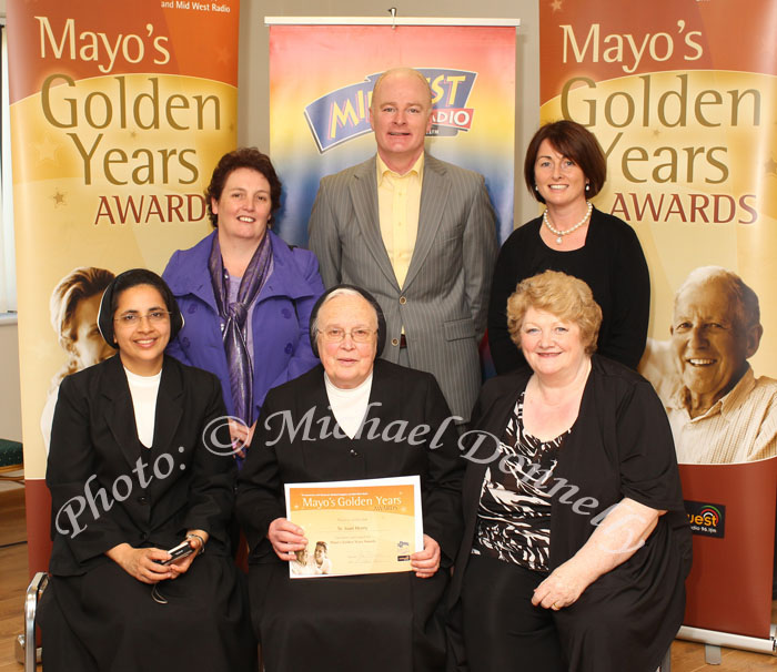 Sr Joan Henry, St Lucy's Playschool Newport, was a finalist at the Mayo's Golden Years Awards 2010 at Homecare Medical Supplies Ballyhaunis in association with Mid West Radio, pictured front from left: Sr Jiji George; Sr Joan Henry and Nancy Flynn McFadden; At back Mary Chambers, Tommy Marren, Mid West Radio and Mary Baynes. Photo:Michael Donnelly