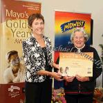 Rita Higgins, Balla is presented with her certificate  for  "Good Neighbour" finalist by Mary McGuinness,  Homecare Medical Supplies, at the Mayo's Golden Years Awards 2010 at Homecare Medical Supplies, Ballyhaunis in association with Mid West Radio. Photo:Michael Donnelly