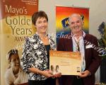 Patrick McDonnell, Lahardane is presented with his certificate  for  "Good Neighbour" finalist by Mary McGuinness,  Homecare Medical Supplies, at the Mayo's Golden Years Awards 2010 at Homecare Medical Supplies, Ballyhaunis in association with Mid West Radio. Photo:Michael Donnelly