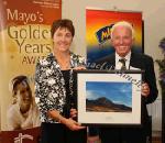 Mary McGuinness,  Homecare Medical Supplies presents the "Good Neighbour Award" to Tom Nyland, Pontoon Rd, Castlebar at the Mayo's Golden Years Awards at Homecare Medical Supplies Ballyhaunis in association with Mid West Radio. Photo:Michael Donnelly,