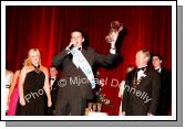 Paddy Burke, Claremorris winner of the No Name Club "Host of the Year" National Youth award 2007 in the TF Royal Theatre Castlebar, pictured on stage during his acceptance speech with compere Nikki Hayes and Anthony McCormack, National Chairman No Name Club. Photo:  Michael Donnelly