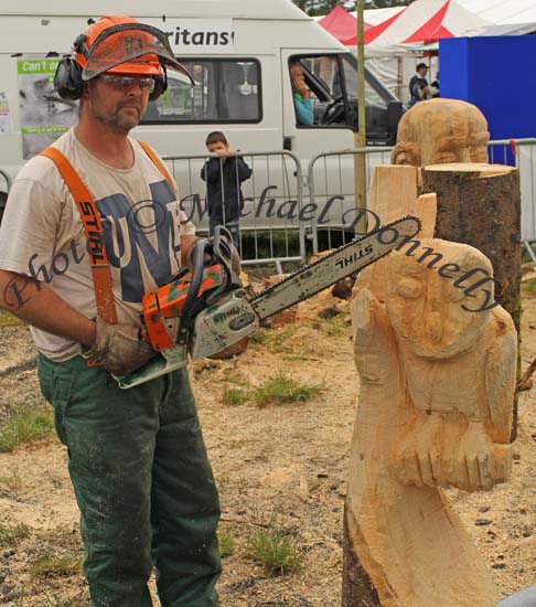 Woodcarver with a Chainsaw completes his owl on a tree at Bonniconlon 61st Agricultural Show and Gymkhana.Photo: © Michael Donnelly