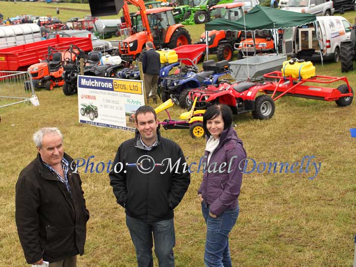 Dominic, Joe and Nicki  Mulchrone,  pictured at their farm Machinery display at Bonniconlon 61st Agricultural Show and Gymkhana. Photo: © Michael Donnelly