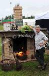 Louis Peppard, of  Lilliput Loaf Company Mullingar, with a Baking Display on open fire at  Bonniconlon 61st Agricultural Show and Gymkhana