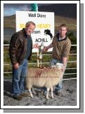 The Danny English Cup is presented by his nephew Pat Vesey to Liam Brennan  for best Crossbred Ewe Lamb (confined) at the Achill Sheep Show at Pattens Bar, Derreens Achill. Photo:  Michael Donnelly